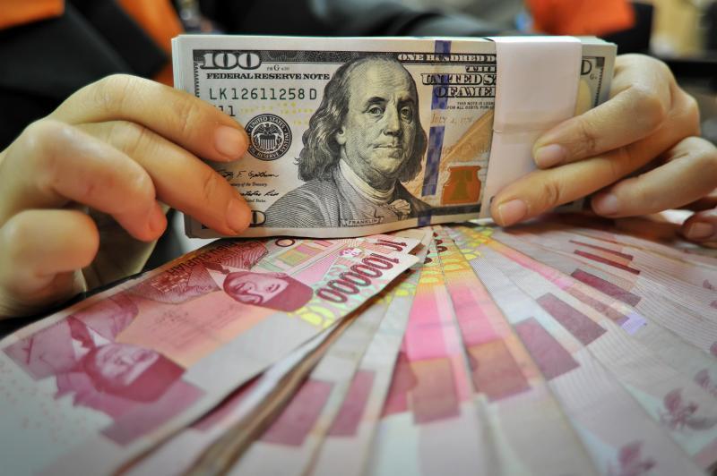 Dolar AS dan Singapura Merangkak Naik