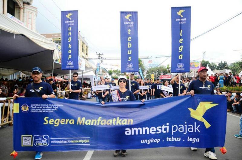  Gaet Minat Masyarakat, Parade Amnesti Pajak Digelar