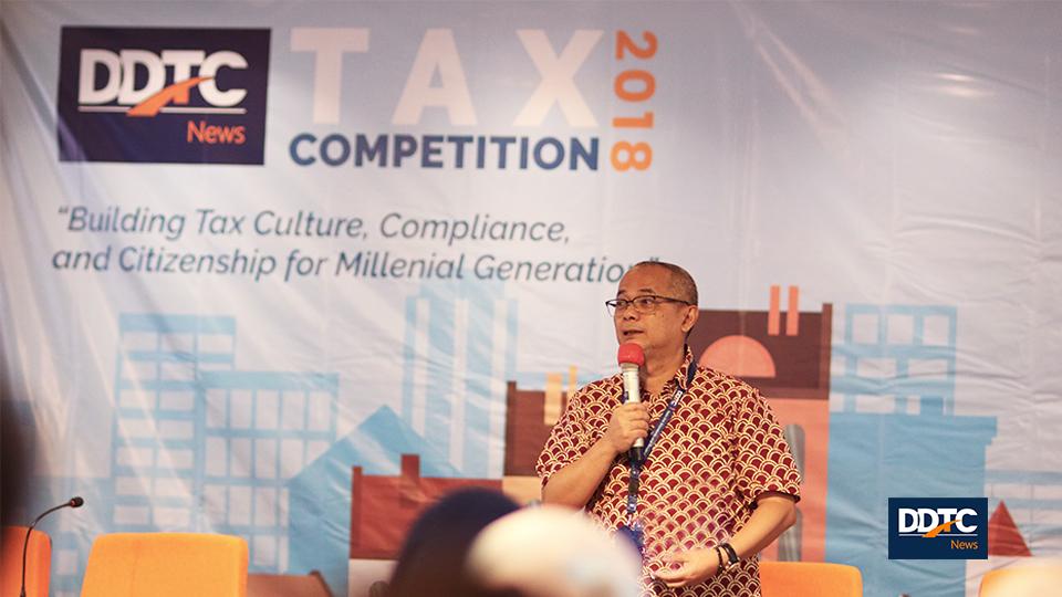 Managing Partner DDTC Darussalam memberikan sambutan sekaligus membuka cerdas cermat, Rabu (3/10/2018). Cerdas cermat merupakan tahap lanjutan setelah seleksi esai dalam DDTCNews Tax Competition 2018 yang diikuti 62 tim dari 18 perguruan tinggi. 